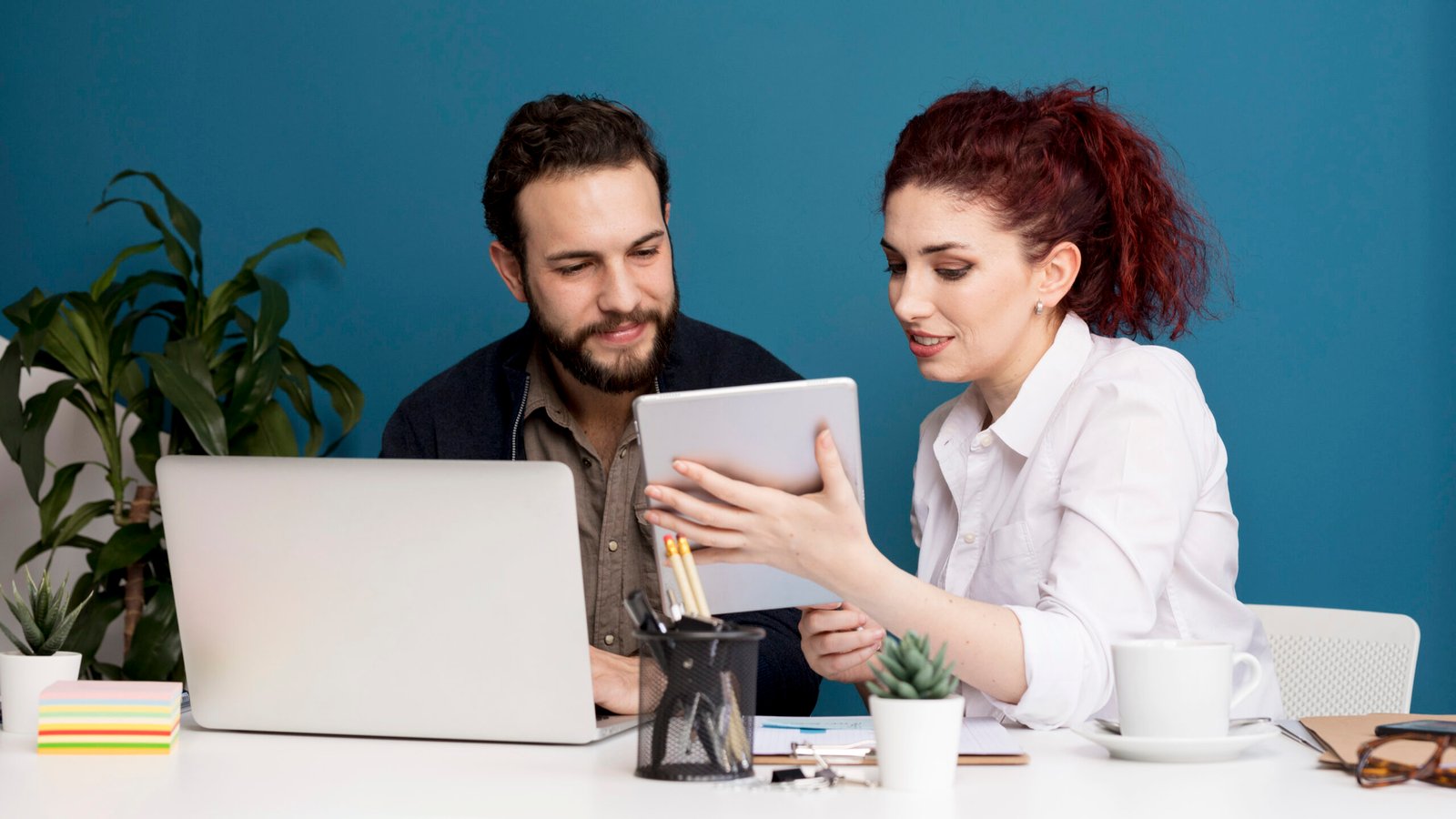 employees brainstorming together scaled